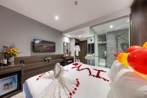 TV a/nebo společenská místnost v ubytování Ivy Hotel Nha Trang