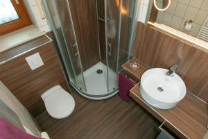 Koupelna v ubytování Apartmenthaus Weber + 37 fotografií