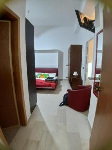 Postel nebo postele na pokoji v ubytování IERRE B&B il piacere dell accoglienza