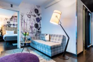 Voodi või voodid majutusasutuse Radisson Blu Riverside Hotel toas