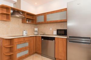 Kuchyňa alebo kuchynka v ubytovaní Rezydencja Portowa 14 - Jantar Apartamenty