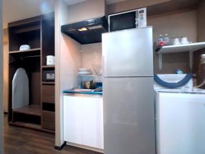 Kuchyň nebo kuchyňský kout v ubytování Le Tour Hotel Akihabara Ekimae 楽途ホテル秋葉原駅前店