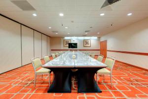 a conference room with a large table and chairs at Holiday Inn San Francisco - Golden Gateway newly renovated with No Resort Fee in San Francisco