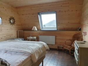 Postel nebo postele na pokoji v ubytování Vue sur Meuse