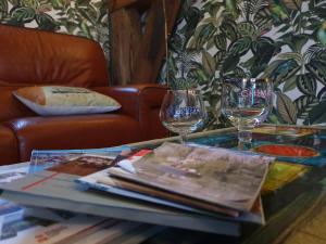Coin salon dans l'établissement Vue sur Meuse