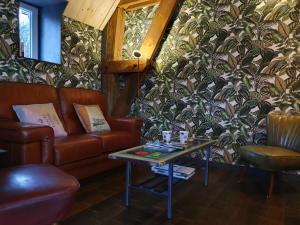 Coin salon dans l'établissement Vue sur Meuse
