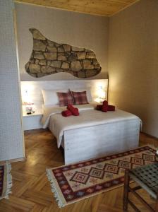 Voodi või voodid majutusasutuse Guesthouse Litoros toas +25 fotot