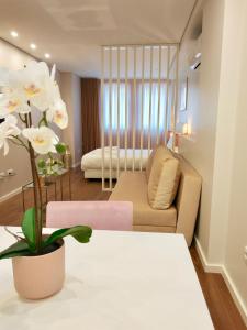 Giường trong phòng chung tại Terro Collection - São Vicente 86