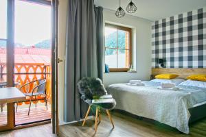 Posteľ alebo postele v izbe v ubytovaní Apartamenty Magia Gór