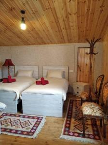 Postel nebo postele na pokoji v ubytování Guesthouse Litoros