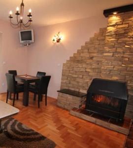 Posezení v ubytování Tara Apartmani Malešević - 1