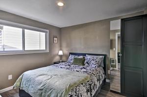 a bedroom with a bed and a window at Estacada Home - Near Milo McIver State Park! in Estacada
