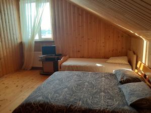 Postel nebo postele na pokoji v ubytování У Мирослави