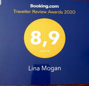 a yellow circle with the number on it at Lina Mogan in Puerto de Mog&aacute;n