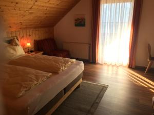 Postel nebo postele na pokoji v ubytování Gerstbreinhof