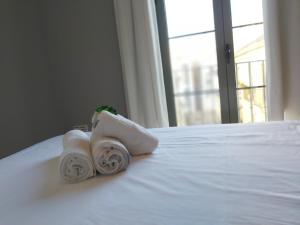 Łóżko lub łóżka w pokoju w obiekcie Del Parque Flats Central