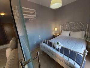 Łóżko lub łóżka w pokoju w obiekcie Del Parque Flats Central