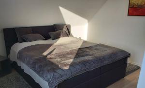 Ένα ή περισσότερα κρεβάτια σε δωμάτιο στο Top-Apartment