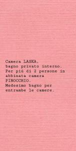 een brief op een roze papier met een opschrift erop bij Aduepassi in Ascoli Piceno