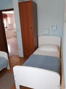 Posteľ alebo postele v izbe v ubytovaní Villa Calypso