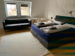 Ένα ή περισσότερα κρεβάτια σε δωμάτιο στο Villa am Wall