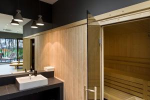 Et badeværelse på Love In Gdańsk AON Apartments