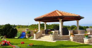 Vonkajšia záhrada v ubytovaní Holiday Apartment VILLA BIANCA