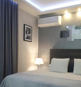 Posteľ alebo postele v izbe v ubytovaní Holiday Apartment VILLA BIANCA