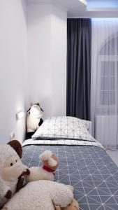 Posteľ alebo postele v izbe v ubytovaní Holiday Apartment VILLA BIANCA