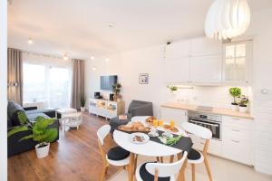 Køkken eller tekøkken på Love In Gdańsk AON Apartments