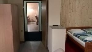 Postel nebo postele na pokoji v ubytování Studia Pod Lysou