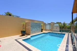 The swimming pool at or close to LUXURY VILLA W POOL & SPAS