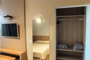 Postel nebo postele na pokoji v ubytování Real Hotel