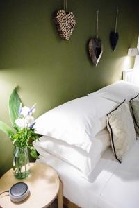 Łóżko lub łóżka w pokoju w obiekcie BB Casamatta