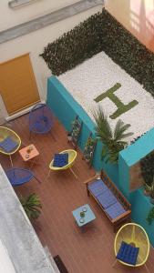 an overhead view of a patio with chairs and tables at Hotel Victoria in Paris