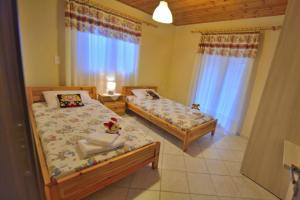 Posteľ alebo postele v izbe v ubytovaní Nonda's Mansion