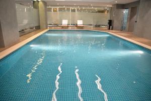 Bazén v ubytování Executives Hotel - Olaya nebo v jeho okolí