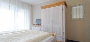 Postel nebo postele na pokoji v ubytování Pension Zöllner Garni