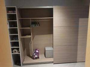 a walk in closet with a drawer and a box at IVY'S CORNER in Luxembourg