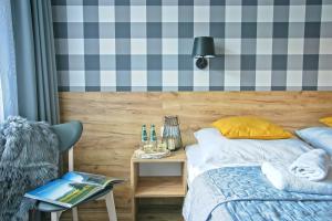 Posteľ alebo postele v izbe v ubytovaní Apartamenty Magia Gór
