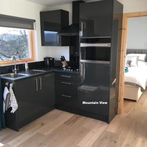 Kuchyň nebo kuchyňský kout v ubytování Grantown Caravan Park