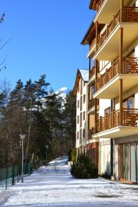Apartmán v Starej Lesnej s balkónom v zime