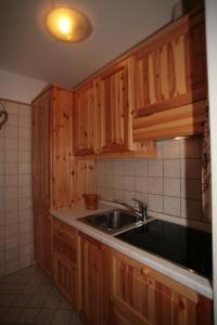 Kuchyň nebo kuchyňský kout v ubytování Residence Valfassa