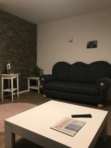 Ein Sitzbereich in der Unterkunft Ferienhaus Kluntje