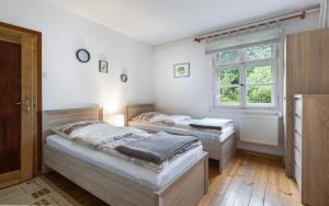 Posteľ alebo postele v izbe v ubytovaní Ruda Buda + 2 fotografie