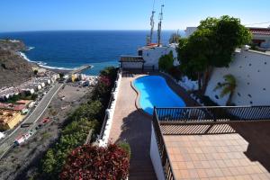 Výhled na bazén z ubytování Villa Altos de Santiago nebo okolí