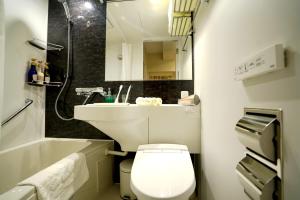 Koupelna v ubytování Le Tour Hotel Akihabara Ekimae 楽途ホテル秋葉原駅前店 + 31 fotografií