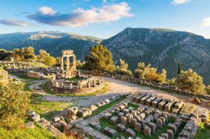 a view of a cemetery with mountains in the background at Santa Marina Arachova Resort & Spa in Arachova