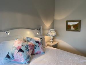 Voodi või voodid majutusasutuse River Meadows B&B toas