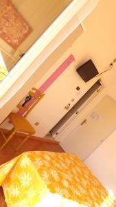 Postel nebo postele na pokoji v ubytování Hotel Alga